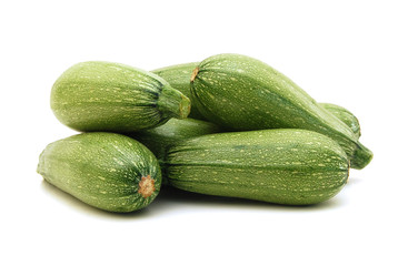 fresh zucchini's on a white background
