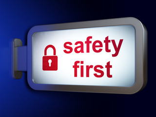 Security concept: Safety First and Closed Padlock on advertising billboard background, 3D rendering