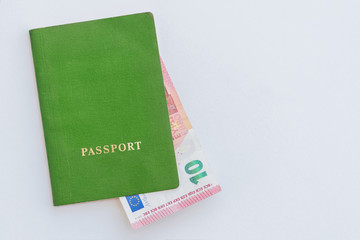 10 euros in the green passport on a white background, close-up