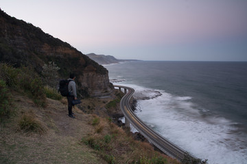 Unknown photographer enjoying the view of Sea Cliff Bridge during sunset.