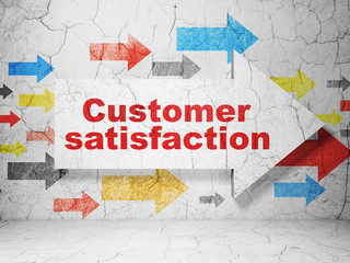 Advertising concept:  arrow with Customer Satisfaction on grunge textured concrete wall background, 3D rendering