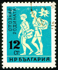 Ukraine - circa 2017: A postage stamp printed in Bulgaria shows drawing Tourists, girls and boyfriend. Wandering Pair. Series: Learn to know your Homeland. Circa 1961.
