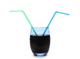 Glass of grape juice with straw, isolated on white background