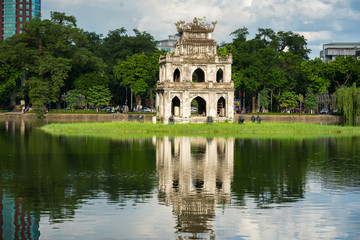 Fototapeta na wymiar Turtle Tower (Thap Rua) in Hoan Kiem lake (Sword lake, Ho Guom) in Hanoi, Vietnam.