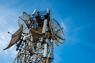 Telecommunications antenna for radio, television and telephone with blue sky