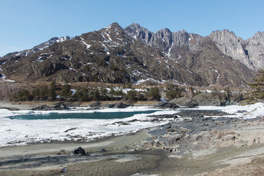 Ice melting in the river in early spring, Katun River, Altai, Russia