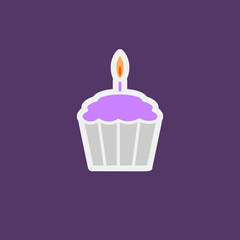Vivid birthday muffin with a lighting candle