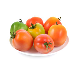Tomato vegetable in white plate isolated on white background