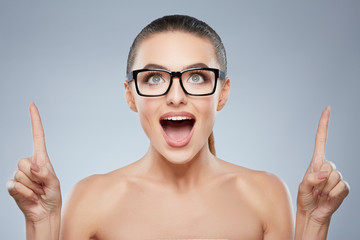 Beauty portrait of happy smiling woman in glasses