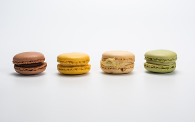 Obraz na płótnie Canvas several small macarons of different flavors