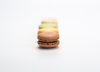 several small macarons of different flavors