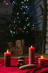 Spa composition with candles on Christmas tree background