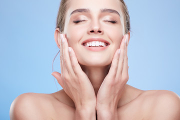 Beauty portrait of happy woman with closed eyes