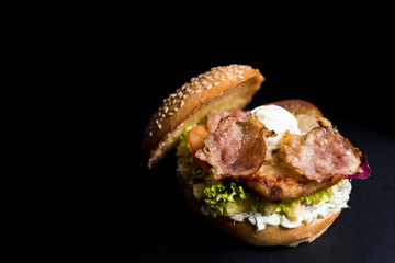Burger with leaves of lettuce and meat