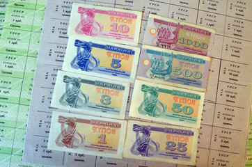 Ukrainian surrogate banknotes of the hyperinflation period of the 90s. Background - Ukrainian food stamps -  circa 1991.Crisis of independence.
