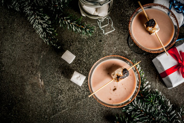 New Year and Christmas drinks idea, Toasted smores martini, dark background, copy space top view