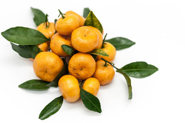 Ripe tangerines on a white background.