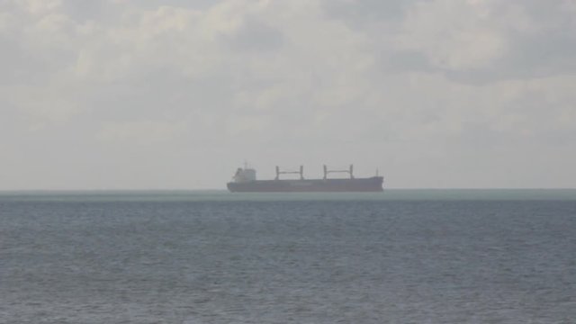 ship, cargo ship on roadstead of port
