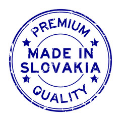 Grunge blue premium quality made in Slovakia round rubber seal stamp on white background