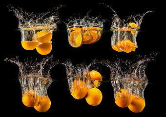 Group of fresh fruits falling in water