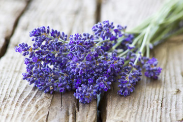 Bunch of lavender flowers on old wooden background