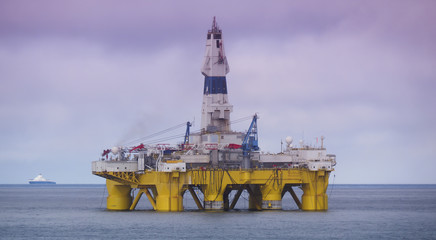 view of offshore drilling rig and vessel, Gulf of Mexico, petroleum industry