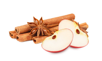 Apple with cinnamon isolated on white background.