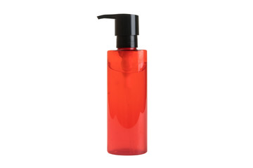 Red cream bottle with black lid on white background