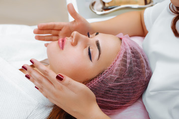Obraz na płótnie Canvas Cosmetic massage, facial treatment.