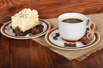 black coffee in a cup with chocolate cake with free space for text