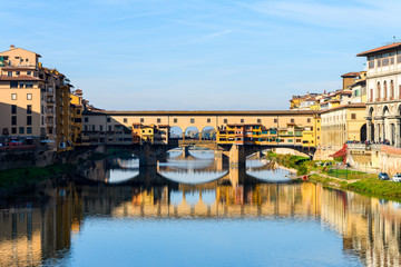 famous ponte vecchio bridge of florence on sunny day