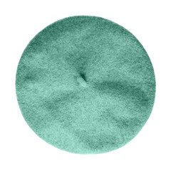 Light turquoise beret French hat top view isolated on white