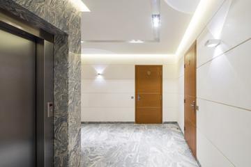 Hall staircase and elevator in a modern block of flats.