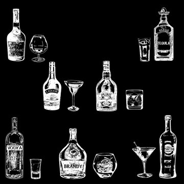 Set of sketch style hand drawn bottles of alcohol and drinks. Vector illustration isolated on black background.