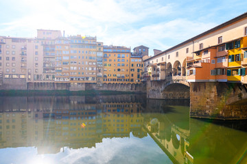 famous ponte vecchio bridge of florence on sunny day