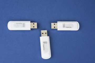 USB keys to save data on the bue background