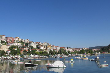 Fototapeta na wymiar harbor city and boats