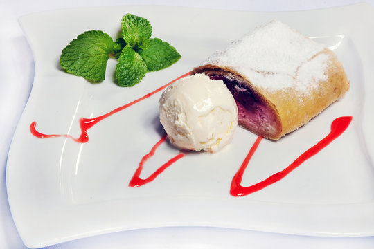 cheesecake with cherry and  ice cream