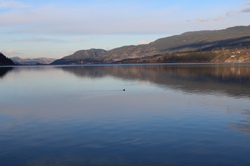 Calm lake and mountains landscape