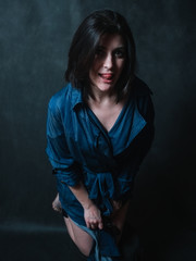 Beautiful brunete women portrait on dark background