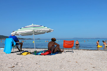 old couple on the beach