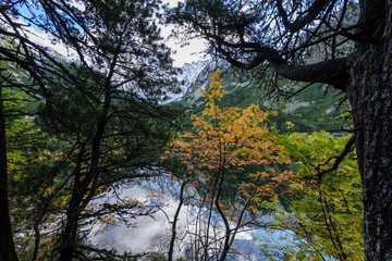 slovakian carpathian mountain lake in autumn. popradske pleso