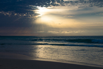 Sunset through scattered clouds 