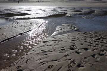 Strand mit Prielen während der Ebbe an der Nordsee