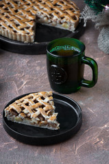 Apple pie with a lattice of whole-grain dough, whole and in pieces