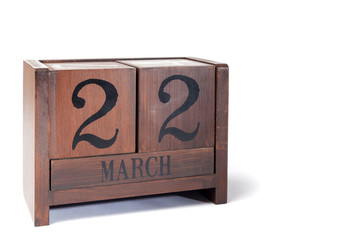 Wooden Perpetual Calendar set to March 22nd