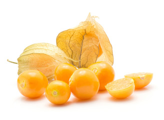 Physalis berries stack isolated on white background two in husk a lot of orange berries one sliced.