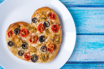 Pizza in the shape of a heart