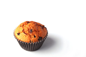 Tasty chocolate cupcakes, muffins on a white wooden table