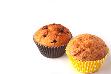 Tasty chocolate cupcakes, muffins on a white wooden table
